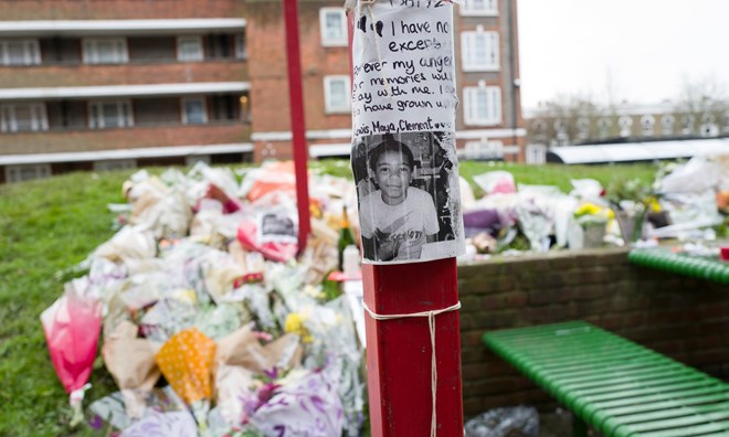 A floral tribute to knife victim Sadiq Adan Mohamed on the Peckwater estate in Camden, London.
Photograph: Andy Hall for the Observer