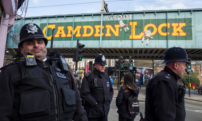 Police on patrol at Camden lock, close to the scene of recent knife crime.
Photograph: Andy Hall for the Observer