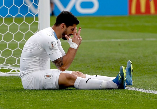 Luis Suarez can't believe he missed in the first half.