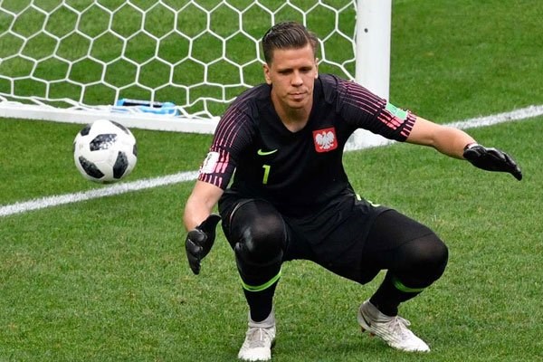 The ball goes past Poland's goalkeeper Wojciech Szczesny after a shot from Senegal's midfielder Idrissa Gana Gueye was deflected off Poland's defender Thiago Rangel Cionek for an own goal for Senegal's opening goal during their 2018 World Cup Group H match at the Spartak Stadium in Moscow on June 19, 2018. PHOTO | ALEXANDER NEMENOV | AFP