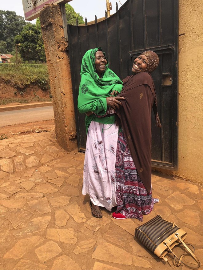 This photo provided by her daughter shows Fadumo Hussein, right, with her 75-year-old mother, Halima Shobe, during a trip to Africa in December 2017. Though the Trump administration's travel ban has made it difficult for refugees from Somalia to come to the U.S., Hussein is still hoping her parents, who have health problems, can eventually join her in Ohio one day. (AP Photo/Afnan Salem)