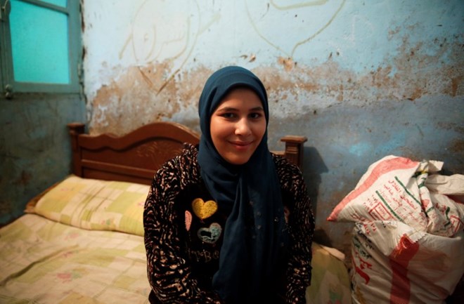 Esraa Salah, 15, looks on at her home in Alwasata village of Assiut Governorate, south of Cairo, Egypt, February 8, 2018. Picture taken February 8, 2018. REUTERS/Hayam Adel