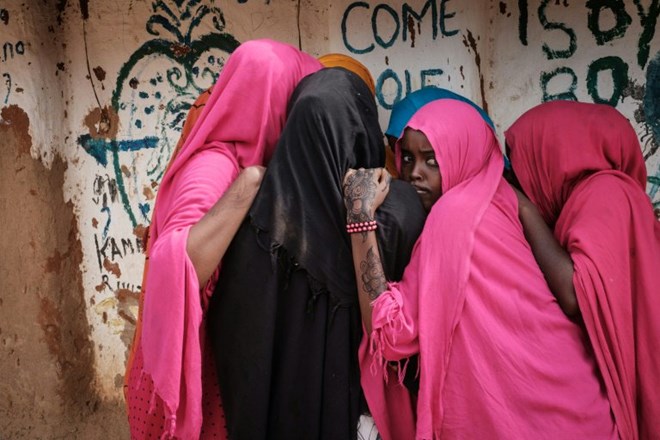 Young Somali refugee women stand together at Dadaab, one of the biggest refugee bases in the world. AFP/File/Yasuyoshi CHIBA
