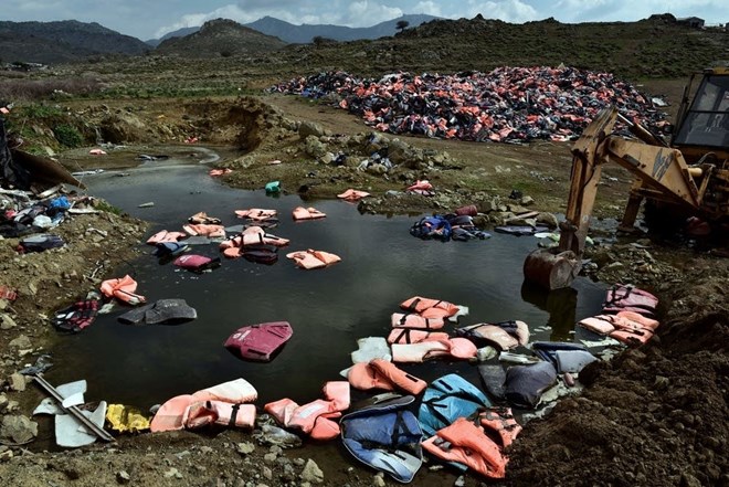 Piles of life jackets left by refugees who arrived to the island of Lesbos lie at a dump on March 15, 2017. Louisa Gouliamaki | AFP | Getty Images 2017