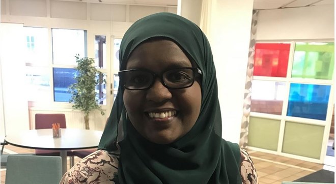 Iman works for the Rinkeby municipality. She is a part of a nightly patrol comprising mothers living in the suburb. [Al Jazeera]