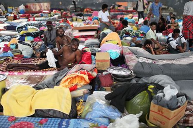 Migrants are seen at the Anti-Illegal Immigration Agency in Tajora shelter center in Tripoli, Libya April 24, 2019. REUTERS/Ahmed Jadallah