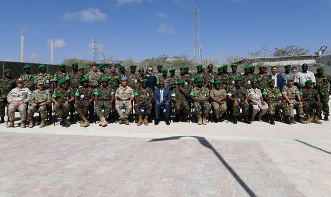 Senior officers from the African Union Mission in Somalia (AMISOM) and other international partners pose for a group photograph after the opening session of the AMISOM Sector Commanders' Conference to discuss and review the Concept of Operations in Mogadishu, Somalia, on 11 February 2019. AMISOM Photo / Omar Abdisalan