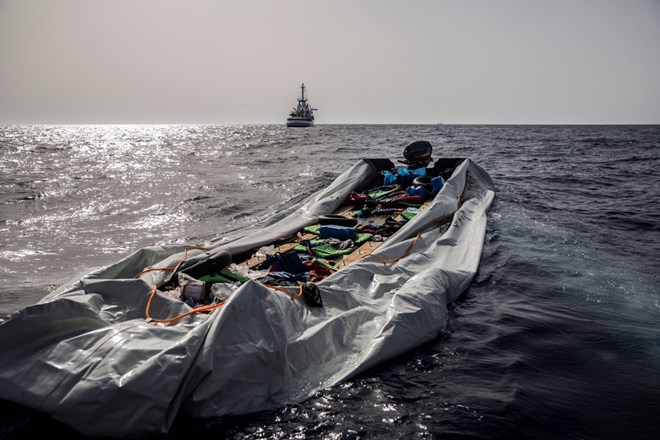 Migrants’ belongings lay on a rubber boat after being rescued by aid workers of Proactiva Open Arms, a Spanish nongovernmental organization. June 2018.CreditOlmo Calvo