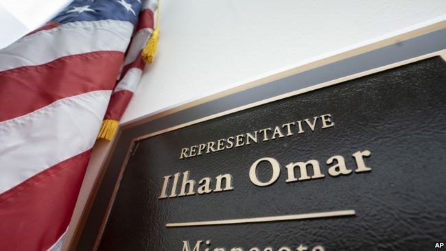 A sign marks the office of incoming Rep. Ilhan Omar, a freshman Democrat representing Minnesota's 5th Congressional District, in the Longworth House Office Building, on Capitol Hill in Washington.