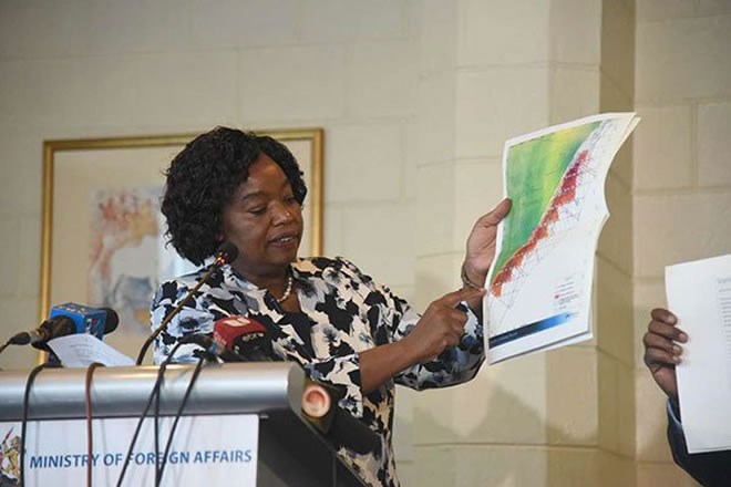Foreign Affairs Cabinet Secretary Monica Juma displays a map indicating that the oil blocks under contention with Somalia are in Kenya's territory, during a press conference at Intercontinental hotel in Nairobi on February 21, 2019. PHOTO | EVANS HABIL | NATION MEDIA GROUP