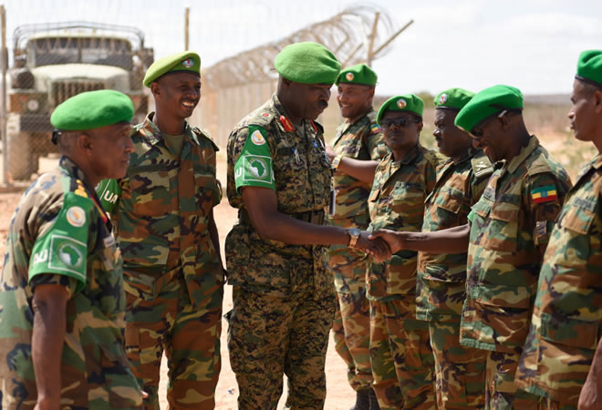 Maj. Gen. Nakibus Lakara, the AMISOM Deputy Force Commander, greets senior military officers from sector four upon arrival at Beletweyne Airport, Somalia on 15 September 2019. AMISOM Photo / Steven Candia